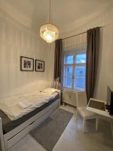 Postel nebo postele na pokoji v ubytování SEEBLICKAPARTMENT BUSINESS Im Zentrum