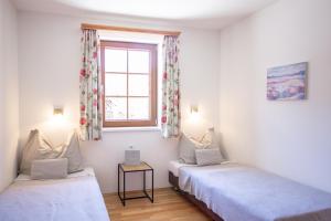 Posteľ alebo postele v izbe v ubytovaní Appartements Stranach