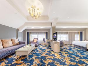 Vuode tai vuoteita majoituspaikassa Yiwu Yunjing Hotel