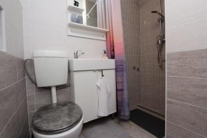 Koupelna v ubytování Apartment Tomi