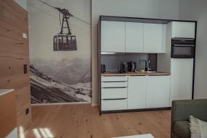 Kuchyň nebo kuchyňský kout v ubytování Mariandl am Berg