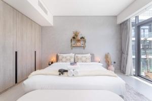 Gallery image of Modern Bali Vibes Studio with Pool and Palm Tree Views JVC in Dubai