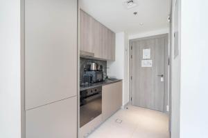 Gallery image of Modern Bali Vibes Studio with Pool and Palm Tree Views JVC in Dubai