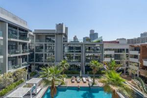 Gallery image of Modern Bali Vibes Studio with Pool and Palm Tree Views JVC in Dubai