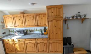 Kuchyň nebo kuchyňský kout v ubytování Ferienwohnung Anderswo