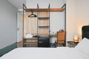 Postel nebo postele na pokoji v ubytování Hotel White House
