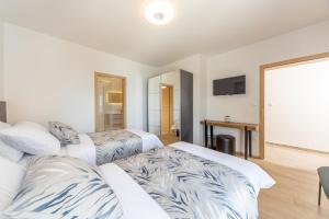 Postel nebo postele na pokoji v ubytování Villa Poseidon