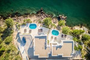 Bazén v ubytování Villa Poseidon nebo v jeho okolí
