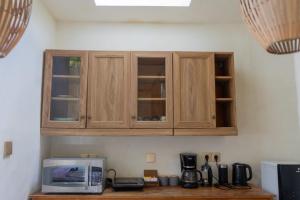 Kuchyň nebo kuchyňský kout v ubytování Eve Evy Private Pool Villas