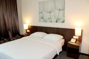 Letto o letti in una camera di The View Hotel