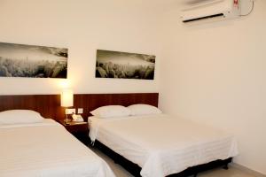 Letto o letti in una camera di The View Hotel