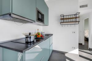 Kuchyňa alebo kuchynka v ubytovaní Casa dei Nonni Apartments