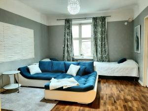 Setusvæði á Stylish home with stunning views of the railway square 74m2