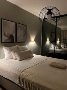 Postel nebo postele na pokoji v ubytování Luksuslukaali