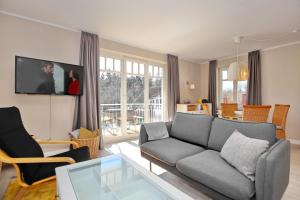 Μια τηλεόραση ή/και κέντρο ψυχαγωγίας στο Villa Seepferdchen Wohnung 05