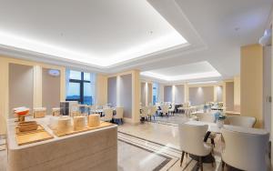Posezení v ubytování Vienna Hotel Chengdu Tianfu Airport Wanhui Center
