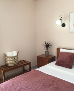 Postel nebo postele na pokoji v ubytování Hotel Triantafyllou