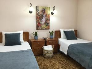 Postel nebo postele na pokoji v ubytování Hotel Triantafyllou + 11 fotografií