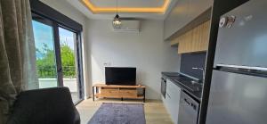 Kuchyň nebo kuchyňský kout v ubytování Tivat Terrace Suites