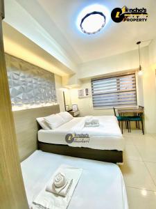 En eller flere senge i et værelse på Studio unit 50b t1