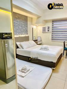 En eller flere senge i et værelse på Studio unit 50b t1