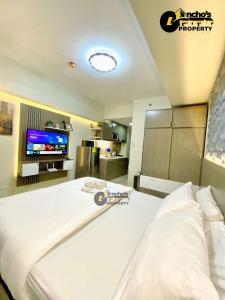 En eller flere senge i et værelse på Studio unit 50b t1 + 2 billeder