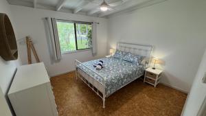 Postel nebo postele na pokoji v ubytování Drift at Rainbow - 3 Bedrooms of Barefoot Vibes