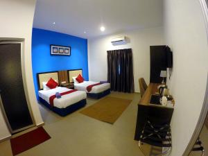 Ein Bett oder Betten in einem Zimmer der Unterkunft Royal Agate Beach Resort