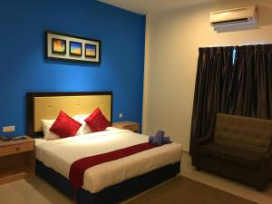 Ein Bett oder Betten in einem Zimmer der Unterkunft Royal Agate Beach Resort