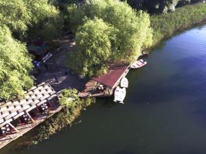 an aerial view of a dock on a river at Wineport Lodge Agva Riverside Hotel & Winery in Ağva