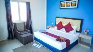 Ein Bett oder Betten in einem Zimmer der Unterkunft Royal Agate Beach Resort