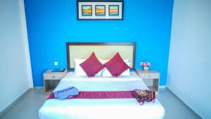 Ein Bett oder Betten in einem Zimmer der Unterkunft Royal Agate Beach Resort