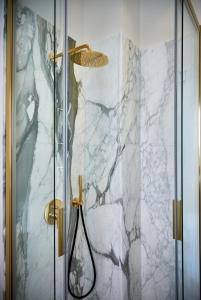 Et badeværelse på Villa Chiara class aparthotel