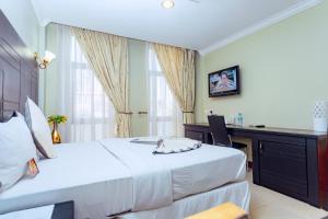TV/trung tâm giải trí tại Panone Hotels - King'ori Kilimanjaro Airport