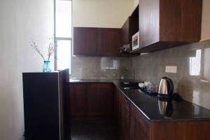 Kuchyň nebo kuchyňský kout v ubytování Marine Suites