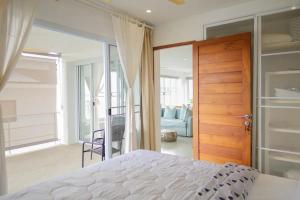Ένα ή περισσότερα κρεβάτια σε δωμάτιο στο 1br Botan Apartment In Chaweng