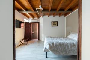 Ένα ή περισσότερα κρεβάτια σε δωμάτιο στο Varenna Apartments by Wonderful Italy