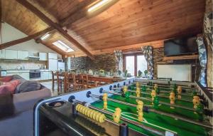 a living room with a pool table in a house at Beautiful Home In Frahan-Sur-Semois in Ban de Laviot