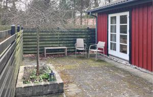 Zahrada ubytování 4 Bedroom Lovely Home In Væggerløse + 13 fotografií