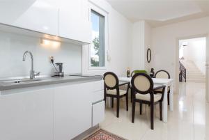 Küche/Küchenzeile in der Unterkunft Apartment Oliva allegra