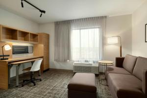 TV a/nebo společenská místnost v ubytování TownePlace Suites by Marriott Alexandria