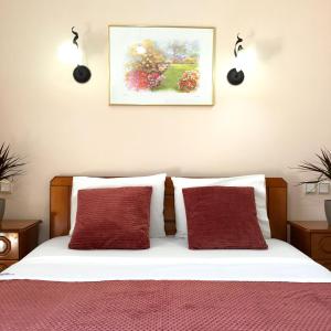 Postel nebo postele na pokoji v ubytování Hotel Triantafyllou