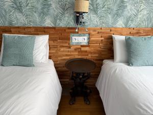 Postel nebo postele na pokoji v ubytování OXXOTEL & Spa