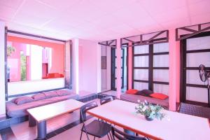 a room with tables and chairs and windows at Apartment with beautiful views - Muralla0218 in Calpe +7 photos
