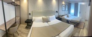 Postel nebo postele na pokoji v ubytování Hotel Zen Airport