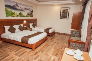 Katil atau katil-katil dalam bilik di Mount View Pokhara