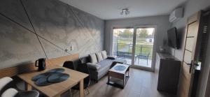 Et opholdsområde på Apartament Bursztyn