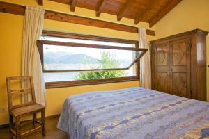 Postel nebo postele na pokoji v ubytování Casa La Terrazza Uno C