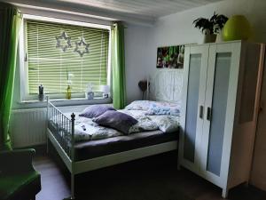 Postel nebo postele na pokoji v ubytování Unterkunft mit Wohlfühleffekt und Flair