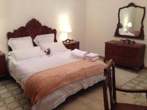 Un pat sau paturi într-o cameră la Casa Justo
